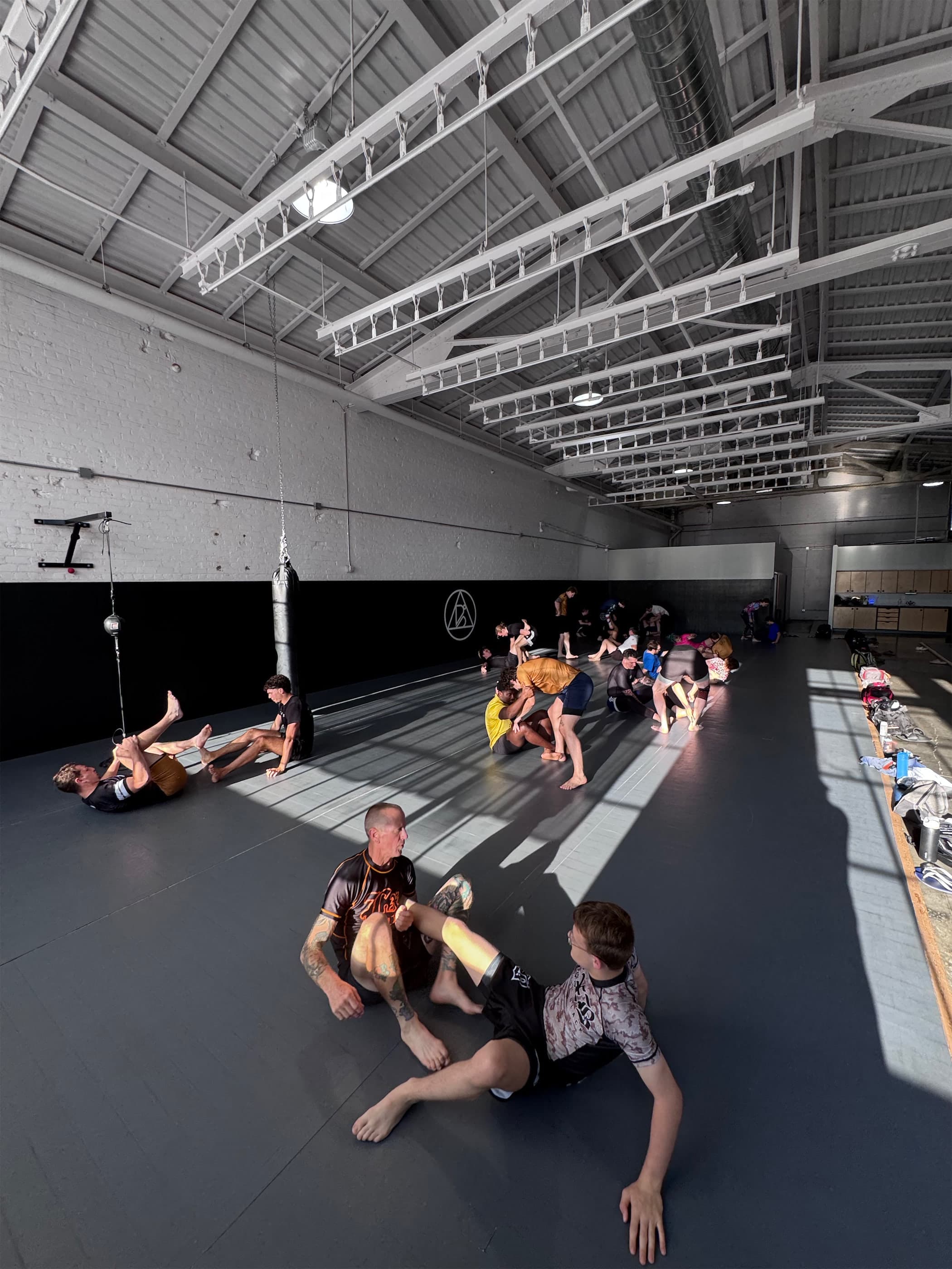 Open mat stretching and conversation at Bendu Academy